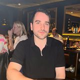 Josh Popkin at fancy steakhouse dinner in Manhattan